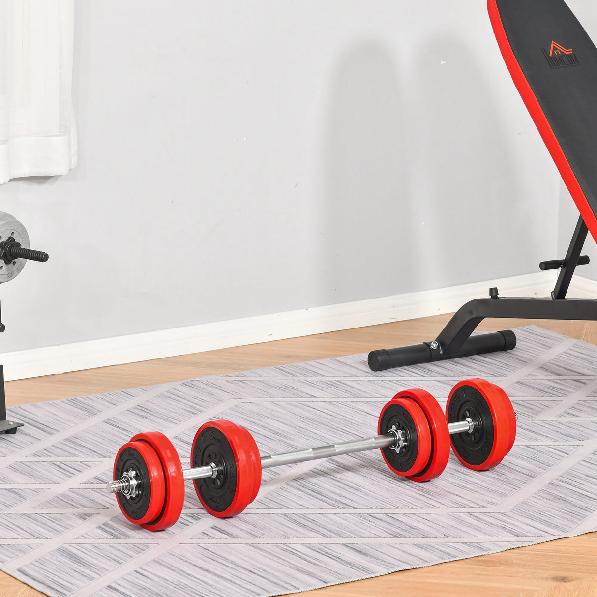 easycomfort set pesi da 20kg in dotazione 1 bilanciere e 2 manubri dischi con rivestimento in plastica antigraffio rosso